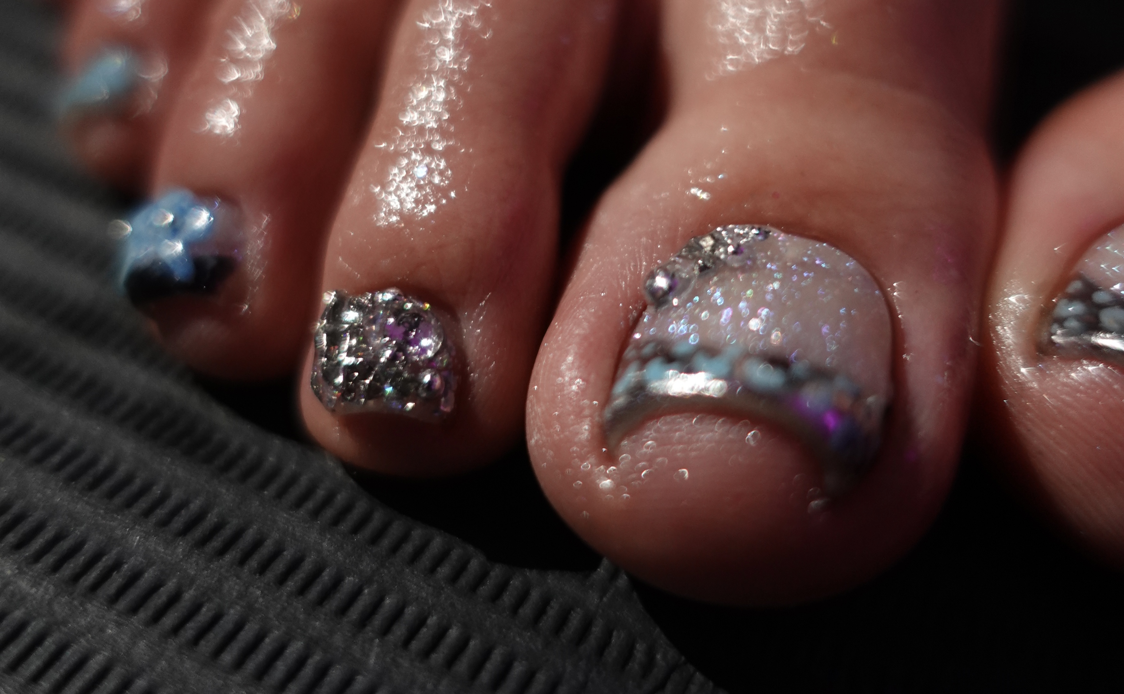 Icy blue French tip manicure with frosted details