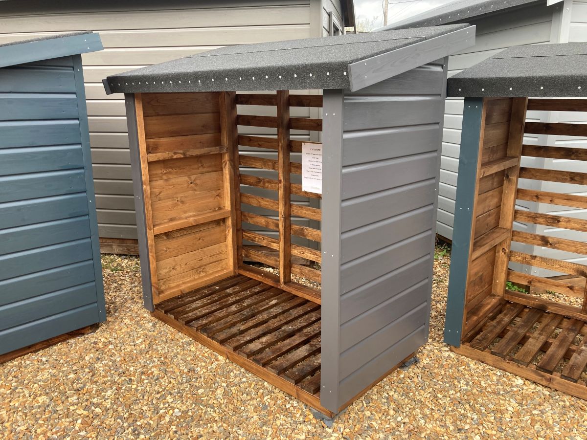 Double Bay Frenchmoor Timber Log Store in countryside garden setting