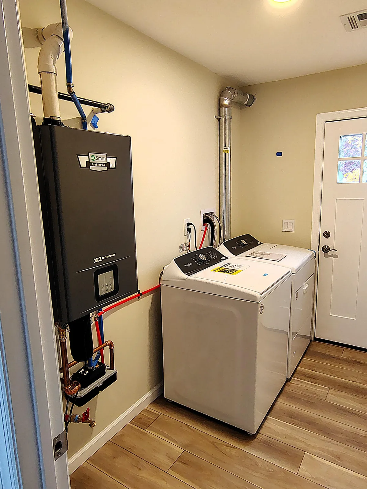 laundry room washer dryer wet room heating system boiler hot water flooring