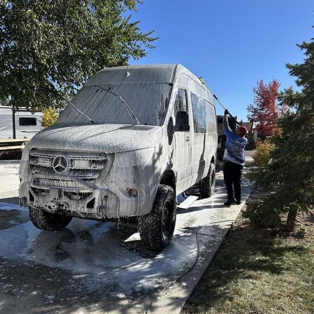 silver sports coupe on asphalt road