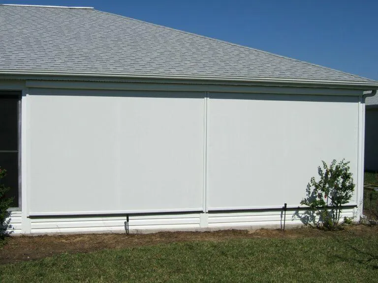 Exterior sunshade helping regulate temperature in Florida sunroom
