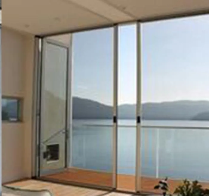 Manual screen closed fully over glass entrance