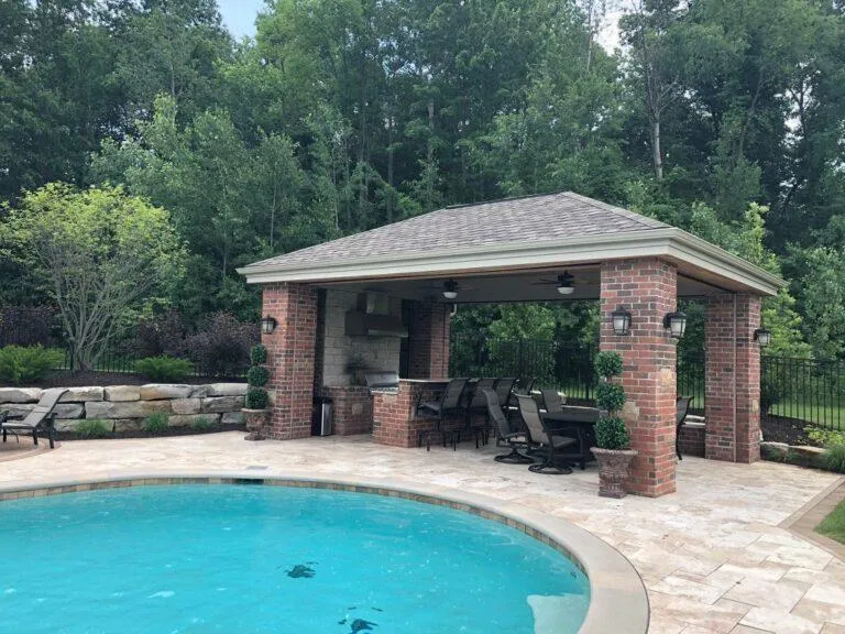 Retractable screen integrated into gazebo providing shade and mosquito protection