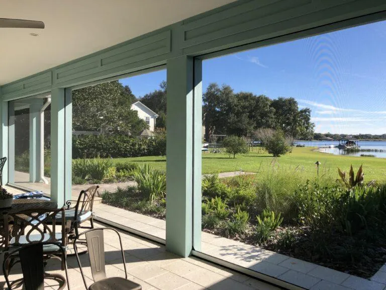 Recessed retractable screen installation blending into architectural framing integrated with home’s structural elements