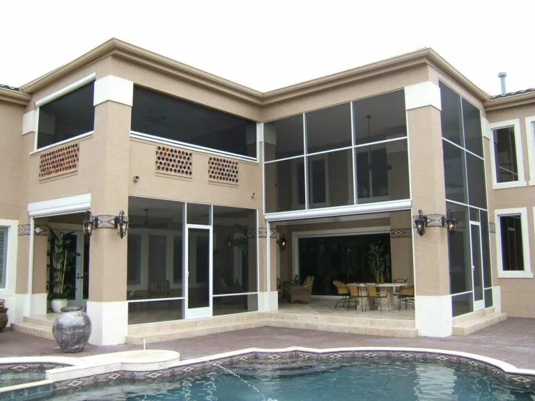 Retractable screen system with fixed panel integration for extended coverage in use during sunset hours