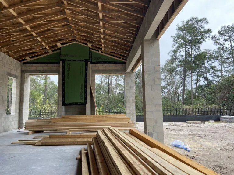 Framing process underway for retractable screen system on residential property at the client's residence