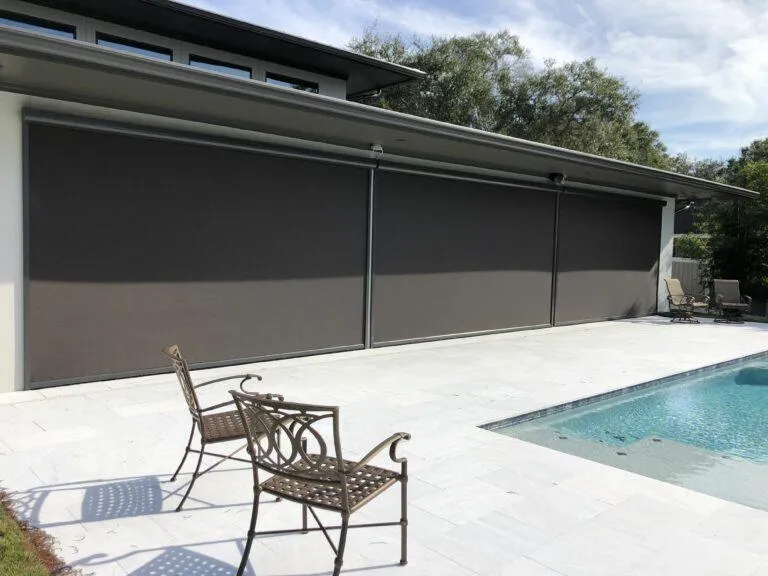 Housed screen unit with integrated solar mesh for sun and insect protection shown during daytime use