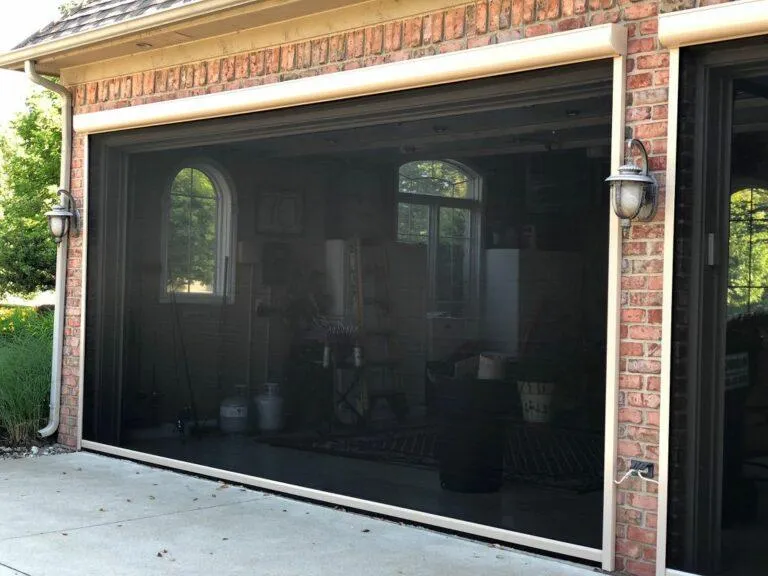 Garage screen designed for insect protection and airflow shown in retracted position