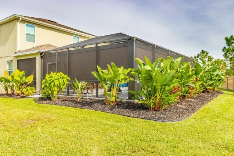 Privacy screen extended to shield outdoor seating from street view