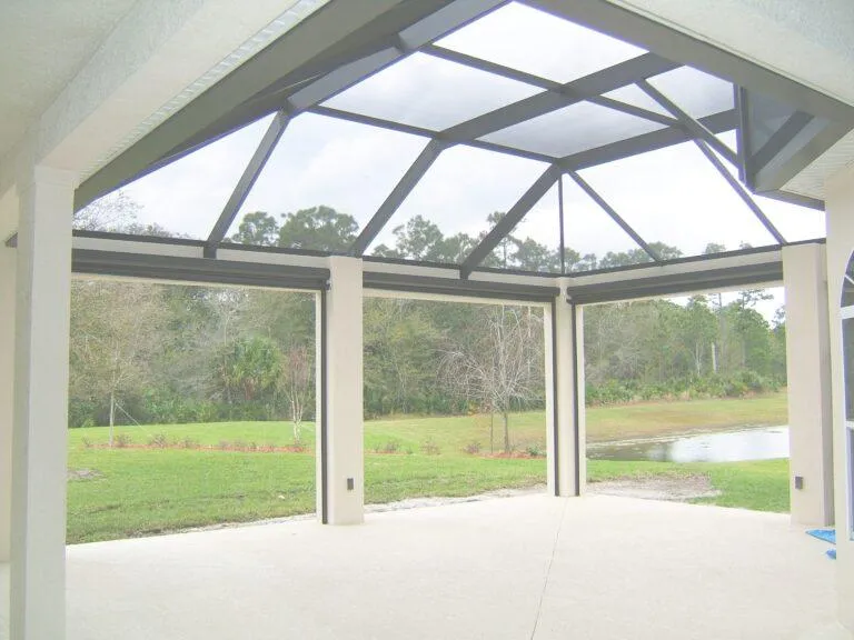 Fully enclosed patio with retractable screen panels for all-season outdoor comfort