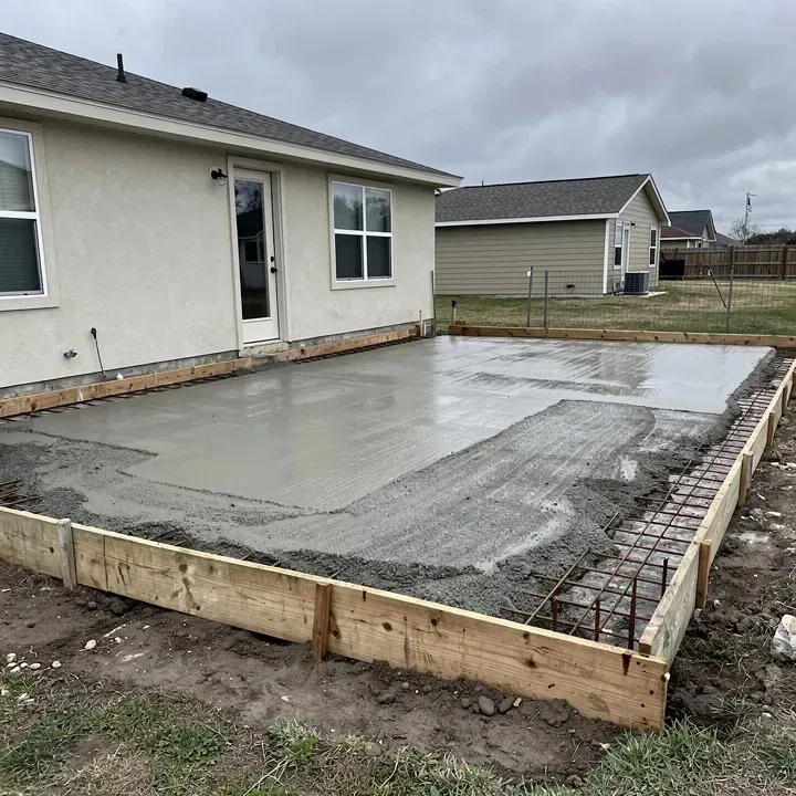 Concrete patio installation in progress at a residential property in Marrero Louisiana