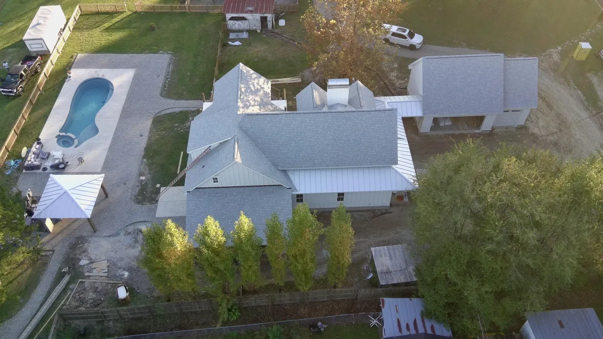 A close up of a roof with a pipe sticking out of it