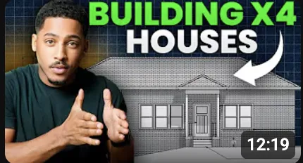 a living room filled with furniture and a kitchen