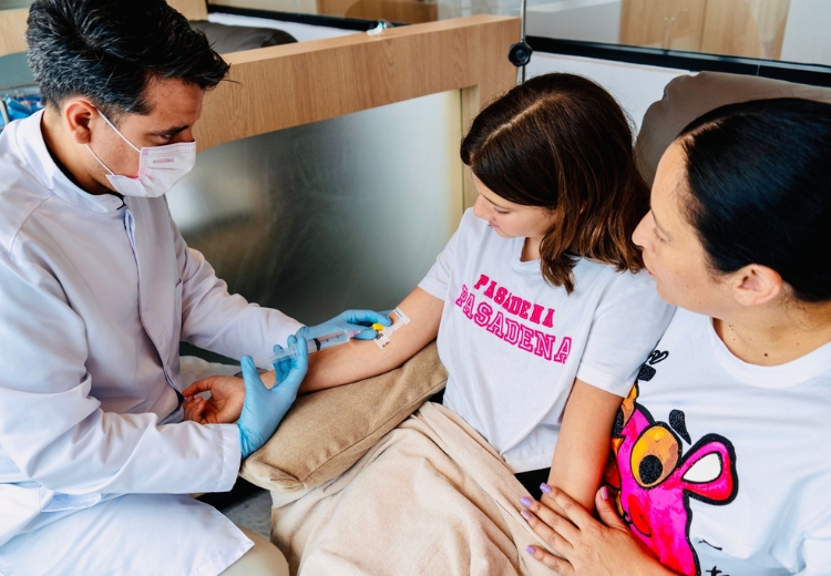 A tranquil moment of beauty enhancement as a skilled professional applies a treatment on a client, radiating confidence and self-care.