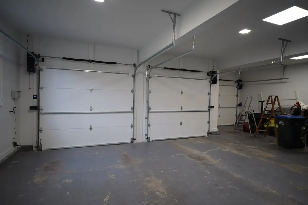 Oakton Virginia new custom WiFi enabled garage door installation after structural repair