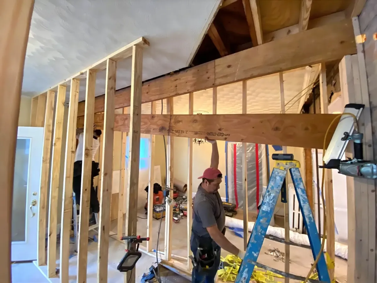 Arlington Virginia LVL beam installation replacing load bearing wall between living room and dining room after fireplace removal