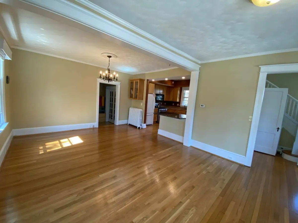 Arlington Virginia completed open concept living and dining room after fireplace chimney and load bearing wall removal in 100 year old home