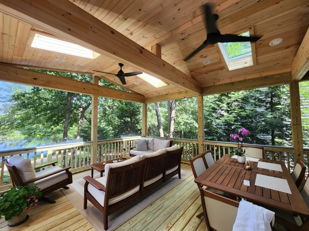 Reston Virginia screened porch addition on 1970s colonial home with composite decking beadboard interior finish and structural engineering