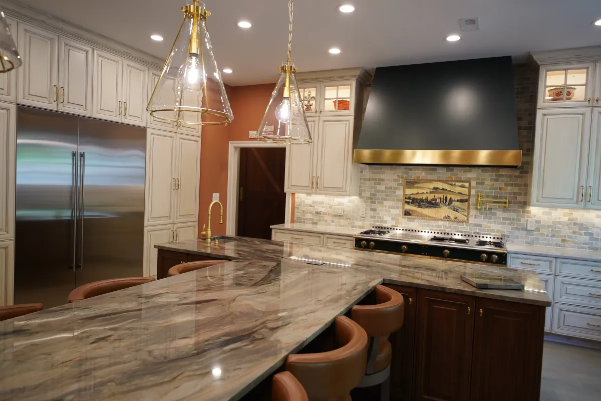 Falls Church Virginia La Cornue 65 inch range with dual ovens five burners French plaque 1200 CFM hood and pot filler in custom kitchen remodel