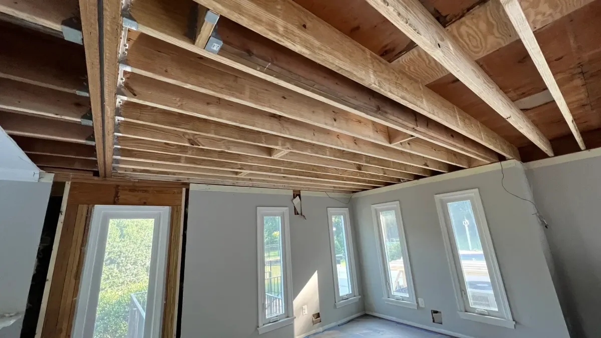 Oakton Virginia second floor joist replacement and new engineered beam installation after illegal structural modifications by previous owner
