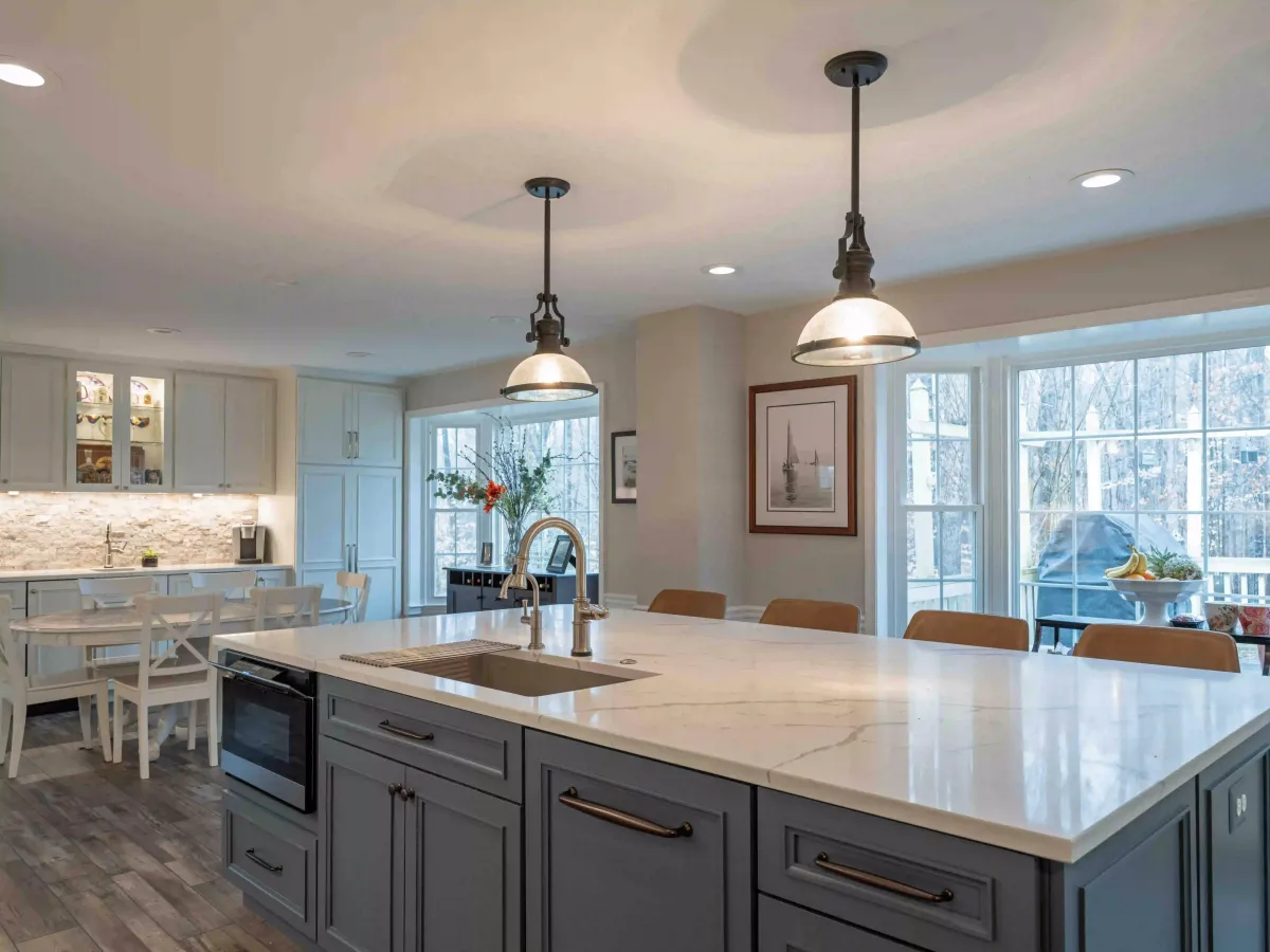 Fairfax Station Virginia completed open concept kitchen with custom island new cabinets countertops and lighting after formal dining room conversion