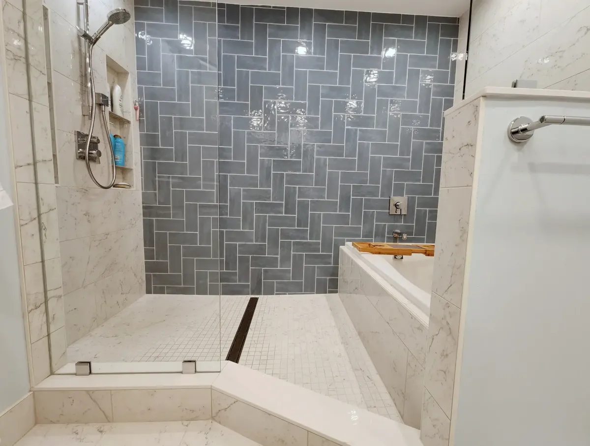Falls Church Virginia Japanese inspired wet room shower with rain shower head and light minimal tile in 1970s townhouse remodel