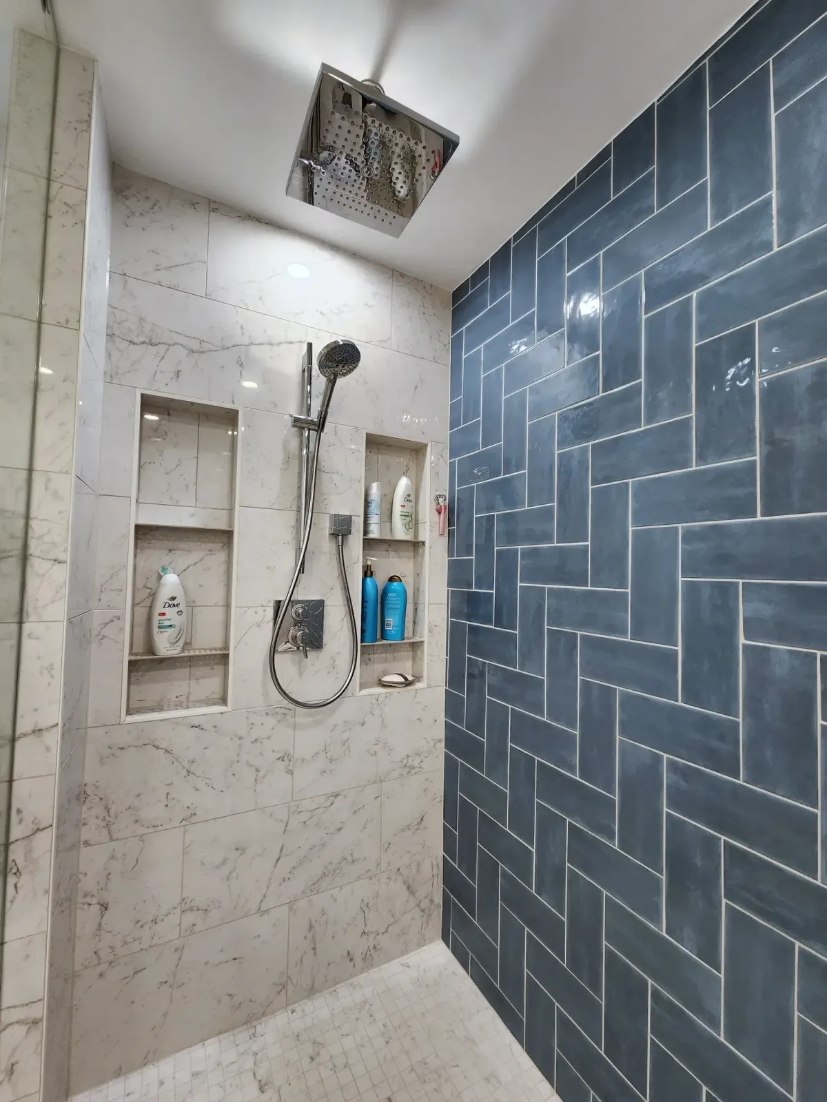 Falls Church Virginia whole home PEX plumbing conversion and tankless hot water heater with recirculating pump during bathroom remodel