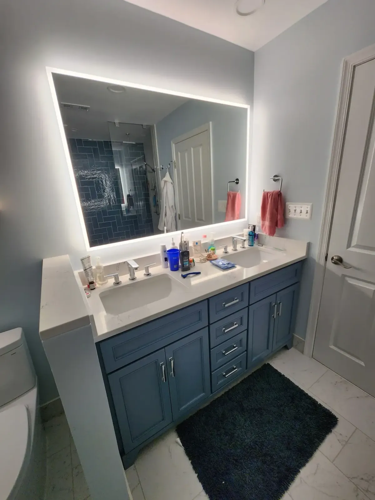 Falls Church Virginia completed Japanese inspired primary bathroom with wet room shower soaking tub dual sinks and upstairs laundry