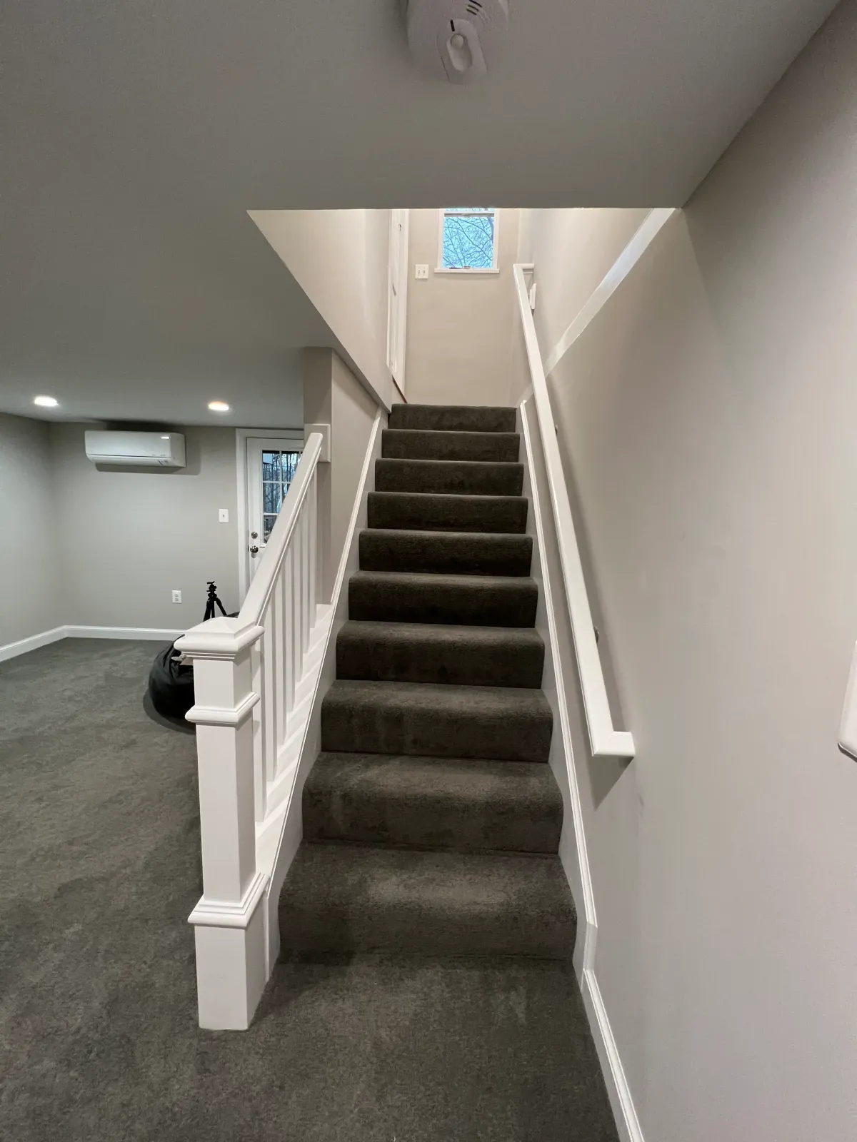 Arlington Virginia 1930s basement staircase redesign with new landing proper headroom and main level floor system modification