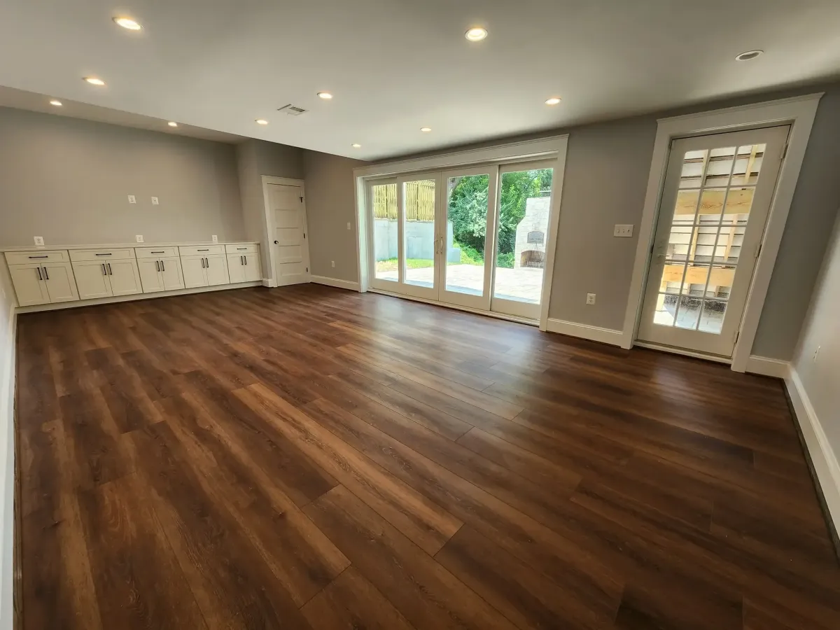  Arlington finished basement family room showing open layout after structural post removal and remodel