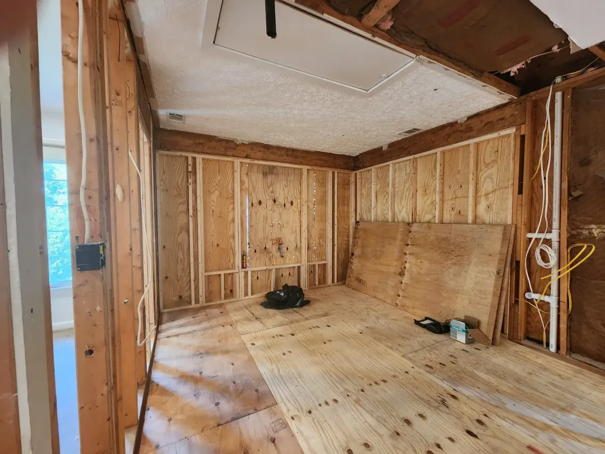 Oakton Virginia enclosed sun porch with missing railings two stories above grade and improperly installed steps before conversion to primary bathroom