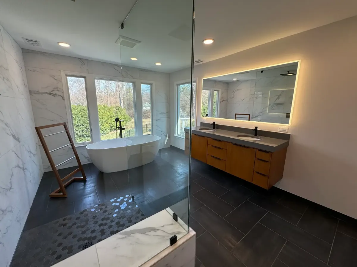 Oakton Virginia curbless shower with tall windows and natural light in primary bathroom suite remodel