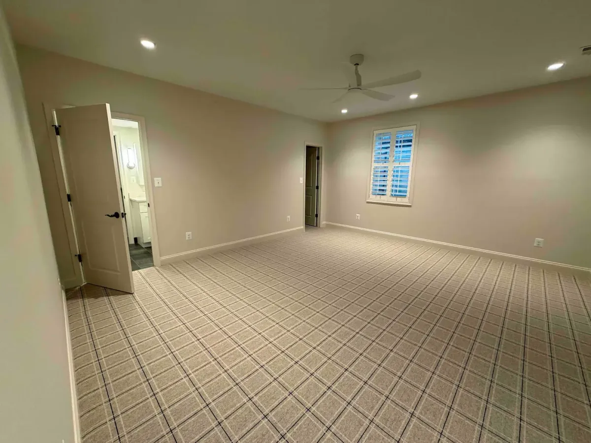Falls Church finished basement remodel showing LVP flooring and custom built-ins throughout