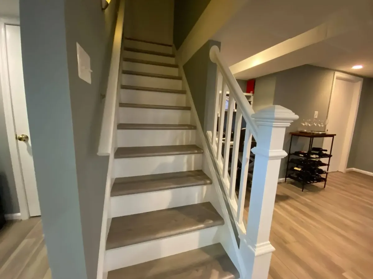 Replaced Arlington basement staircase with new structure, treads, and railings