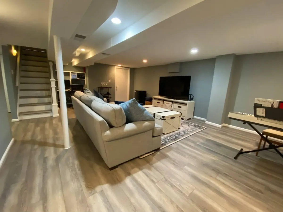Remodeled Arlington basement with LVP flooring throughout and new walk-in storage closet