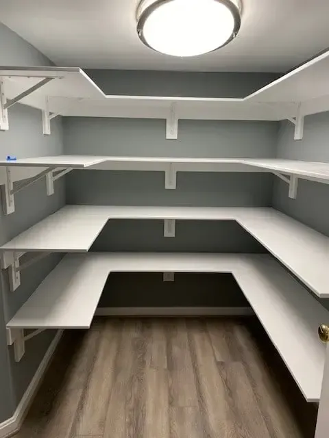 Walk in storage closet with heavy duty shelving - Arlington
