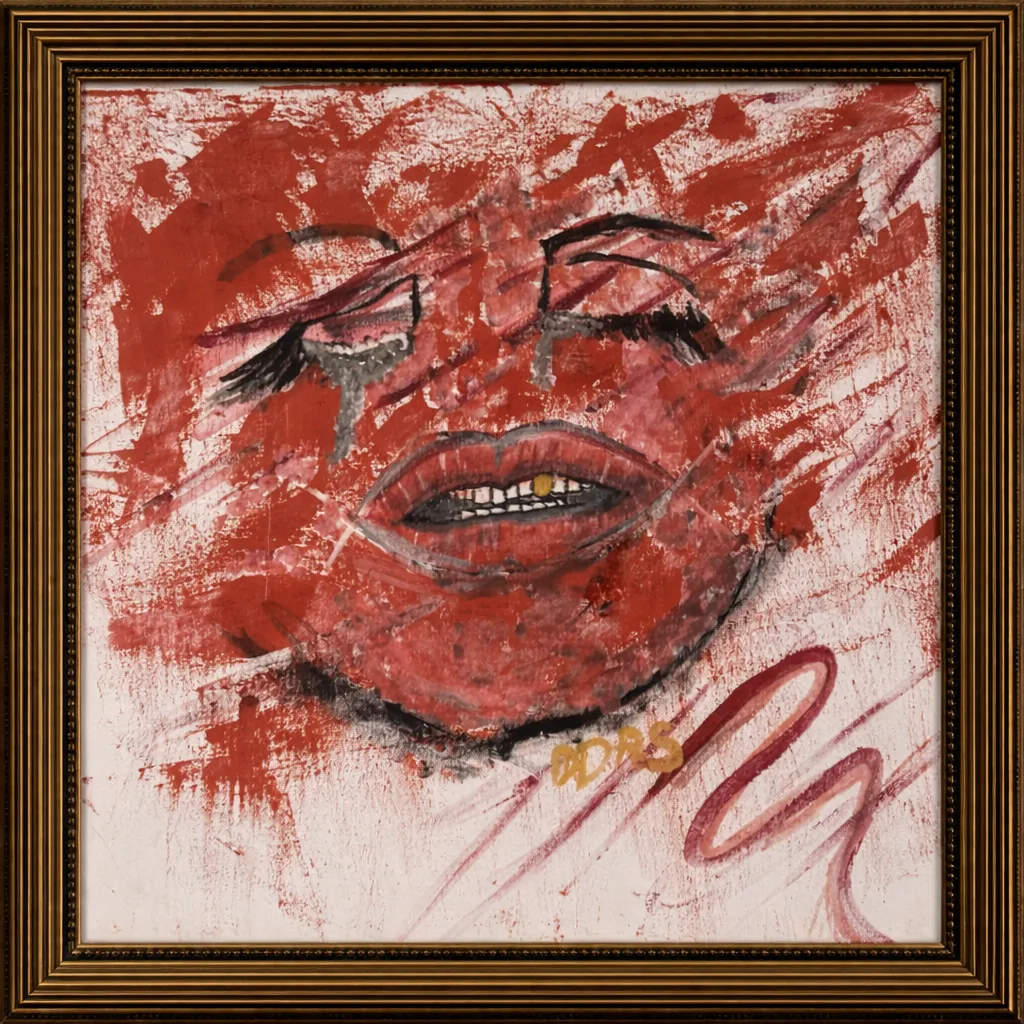 A close-up of a hand holding a paintbrush mid-stroke, with blurred, colorful paint on a canvas in the background. The focus is on the expressive gesture, capturing the moment of creation and the tactile connection between artist and medium. The scene is intimate and evocative.