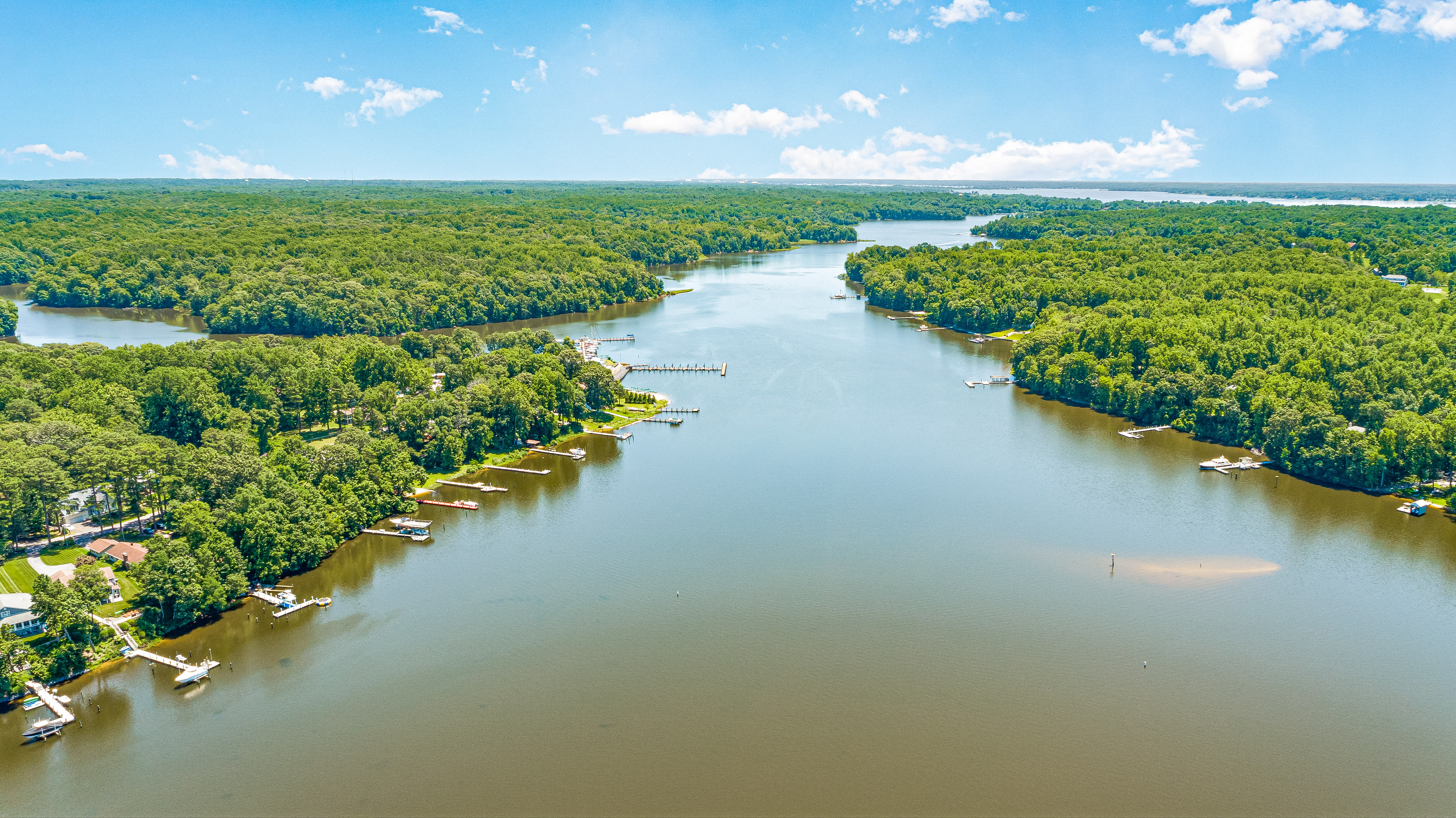 Aerial view of waterfront homes along a river in Southern Maryland Chesapeake Bay area