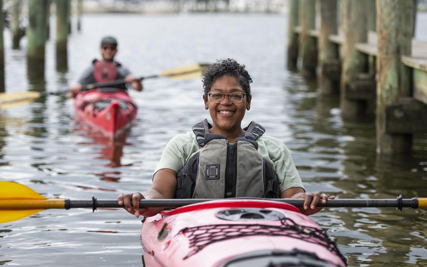 Kayaking in Southern Maryland showcasing Chesapeake Bay waterfront lifestyle and outdoor living