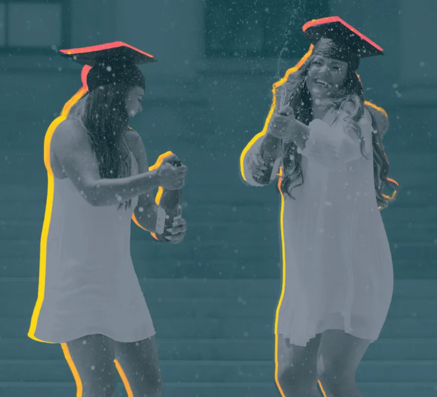 Students celebrating graduation with champagne