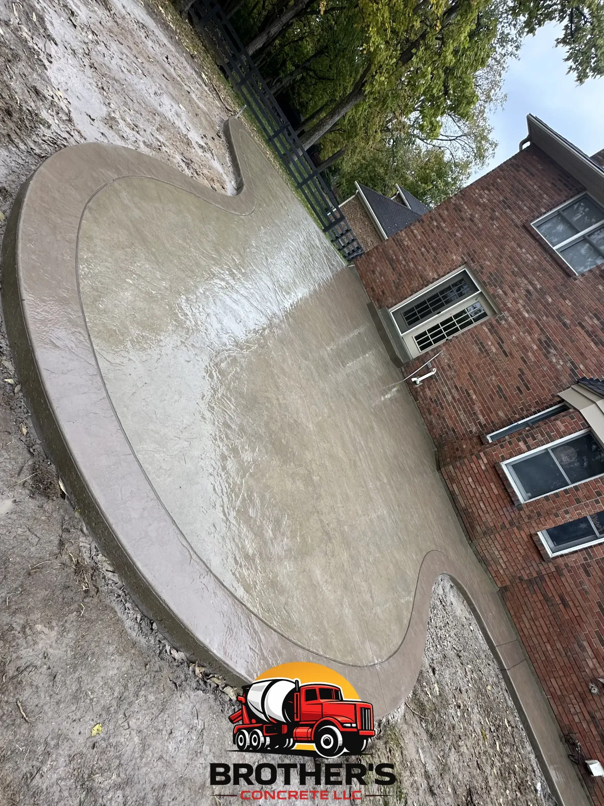 concrete patio installation in Cincinnati Ohio backyard outdoor living space modern design