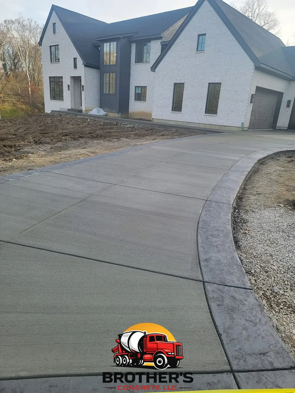 new concrete driveway installation in Cincinnati Ohio suburban home