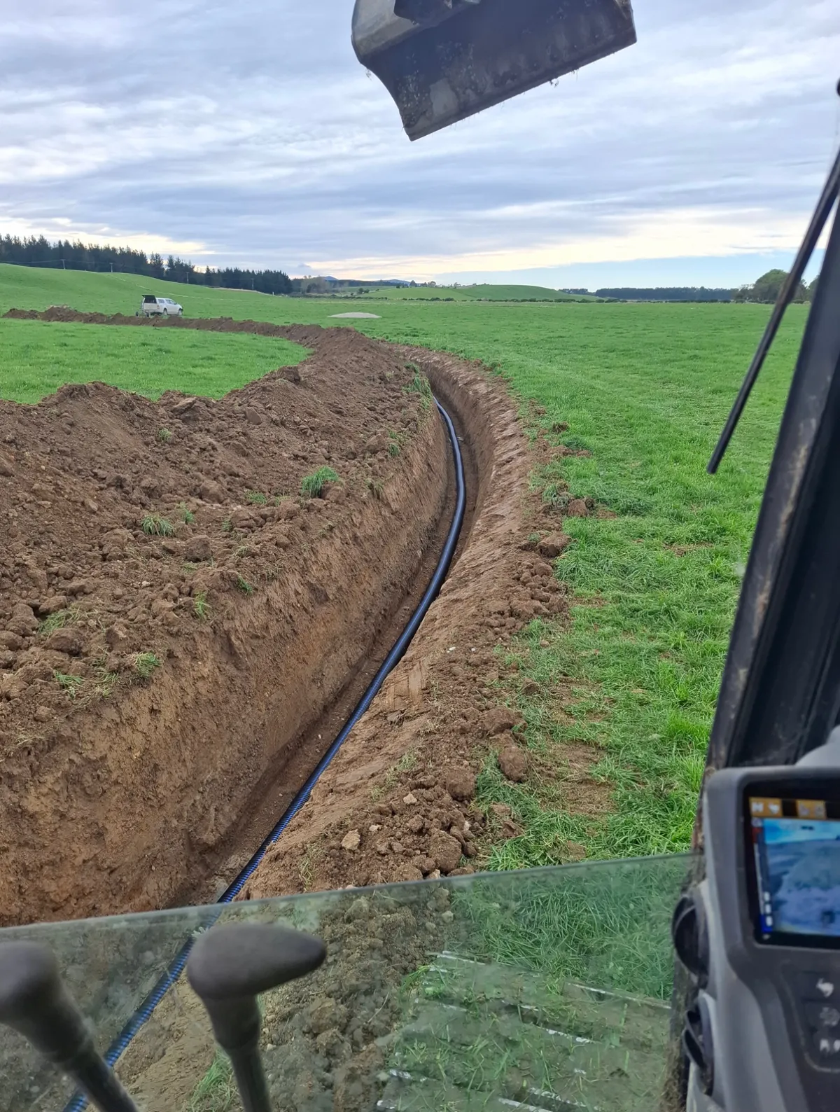 Muck spreading service provided by Dean Moore Excavation, improving farm efficiency in Southland.