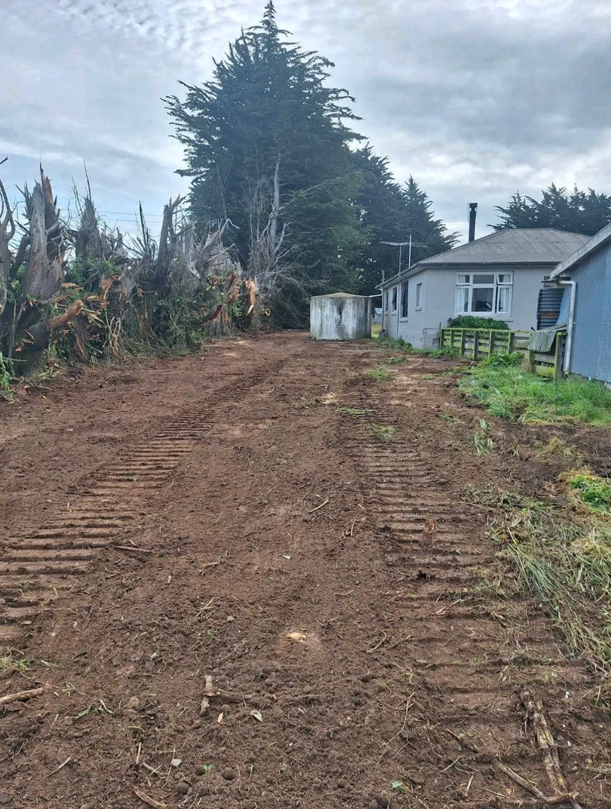 Excavation work by Dean Moore Excavation, showcasing a farm site preparation project in Southland