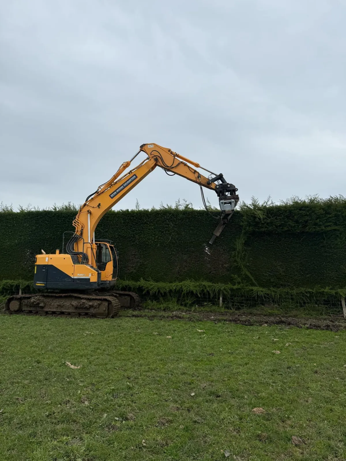 Tractor and trailer services for hauling gravel, rock, and materials on farm and construction projects by Dean Moore Excavation.