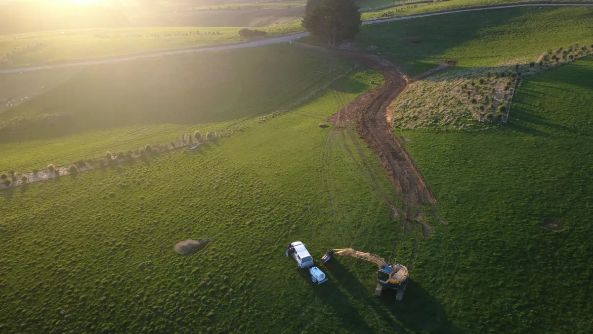 Muck spreading service provided by Dean Moore Excavation, improving farm efficiency in Southland.