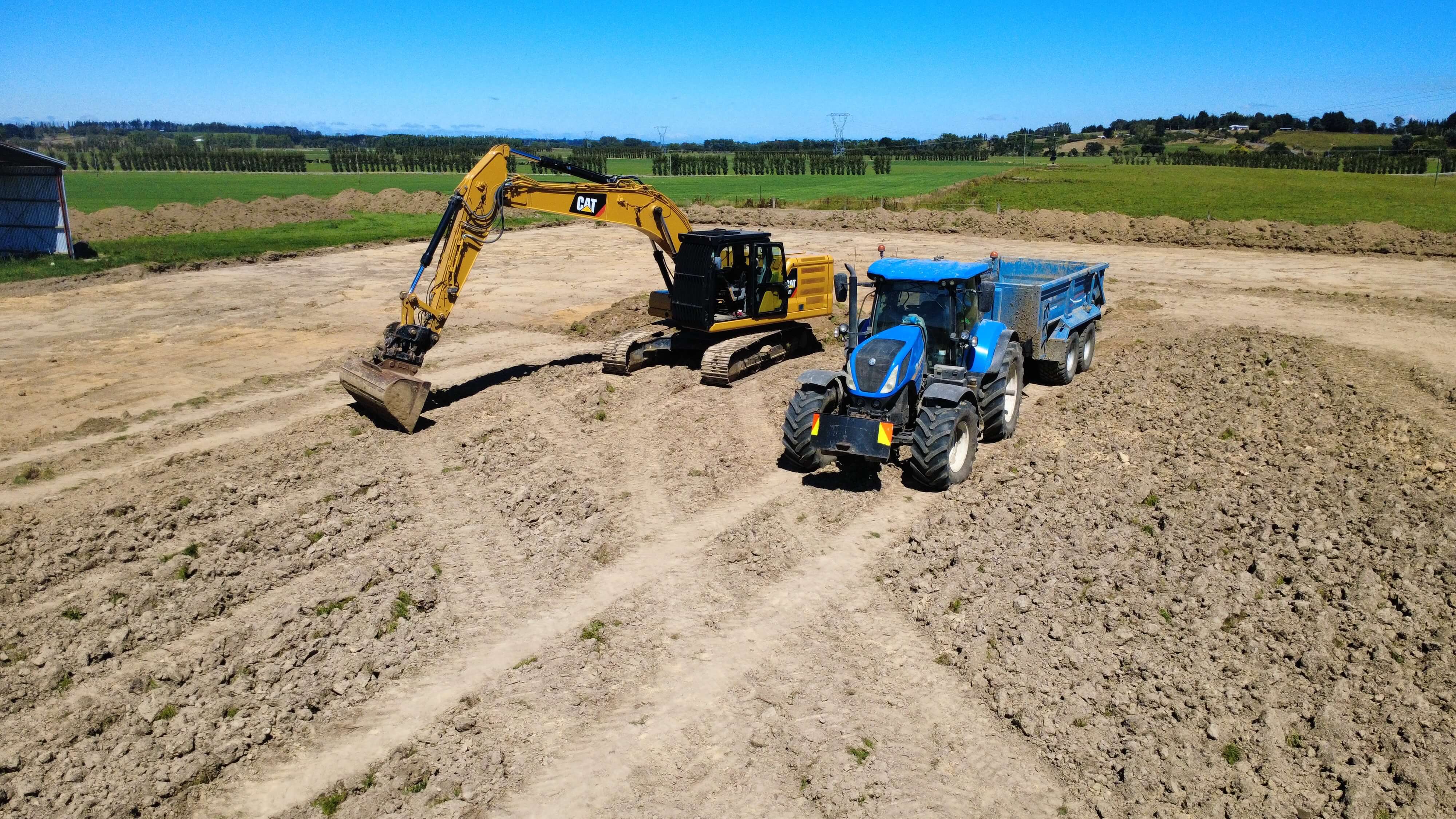 Excavation work by Dean Moore Excavation, showcasing a farm site preparation project in Southland