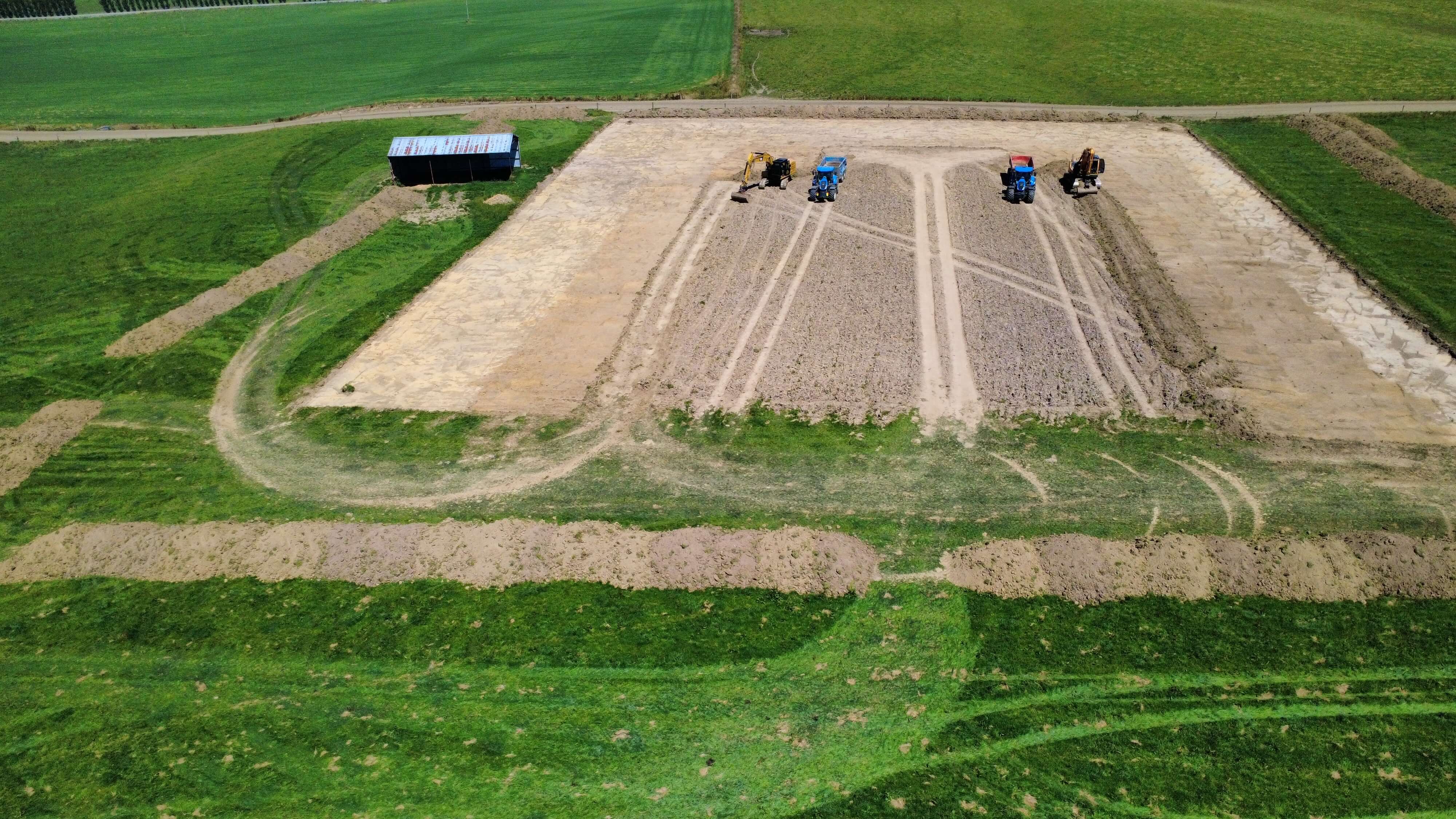 Muck spreading service provided by Dean Moore Excavation, improving farm efficiency in Southland.