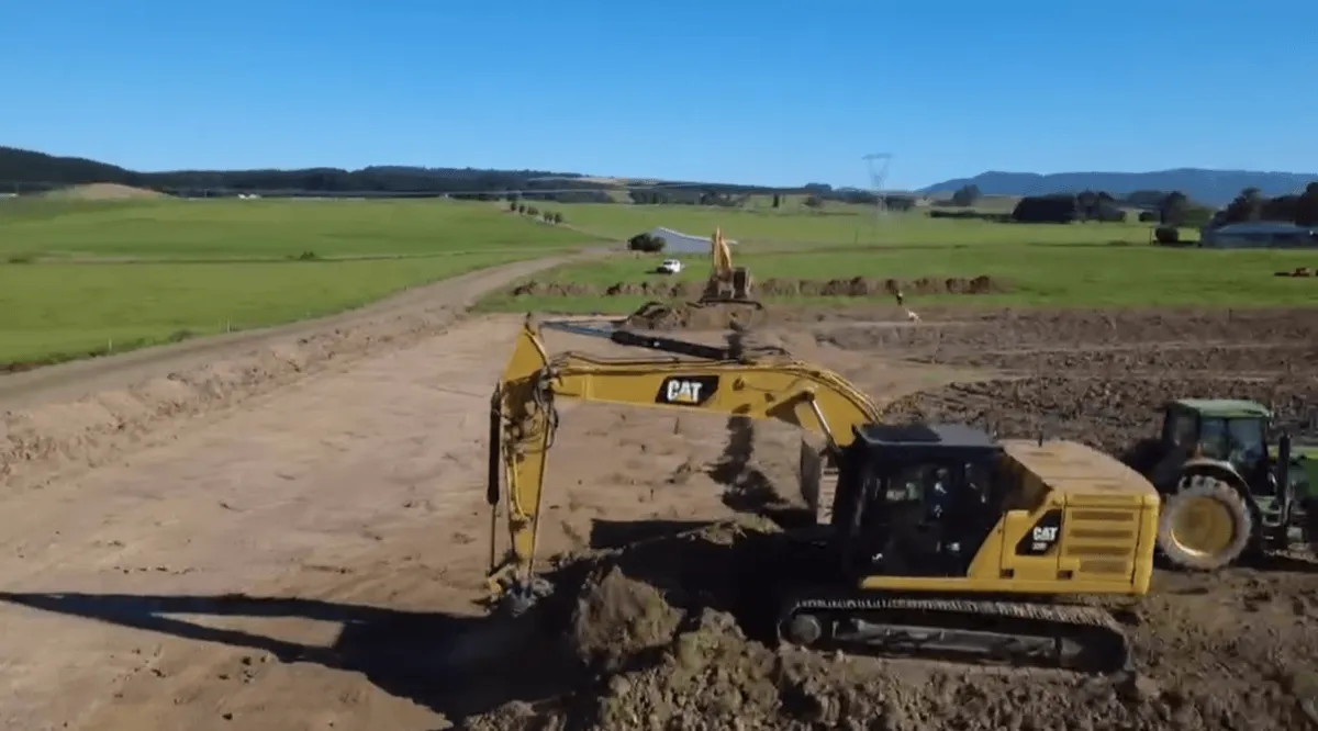 Dean Moore Excavation completing grading and drainage work on a Southland farm.