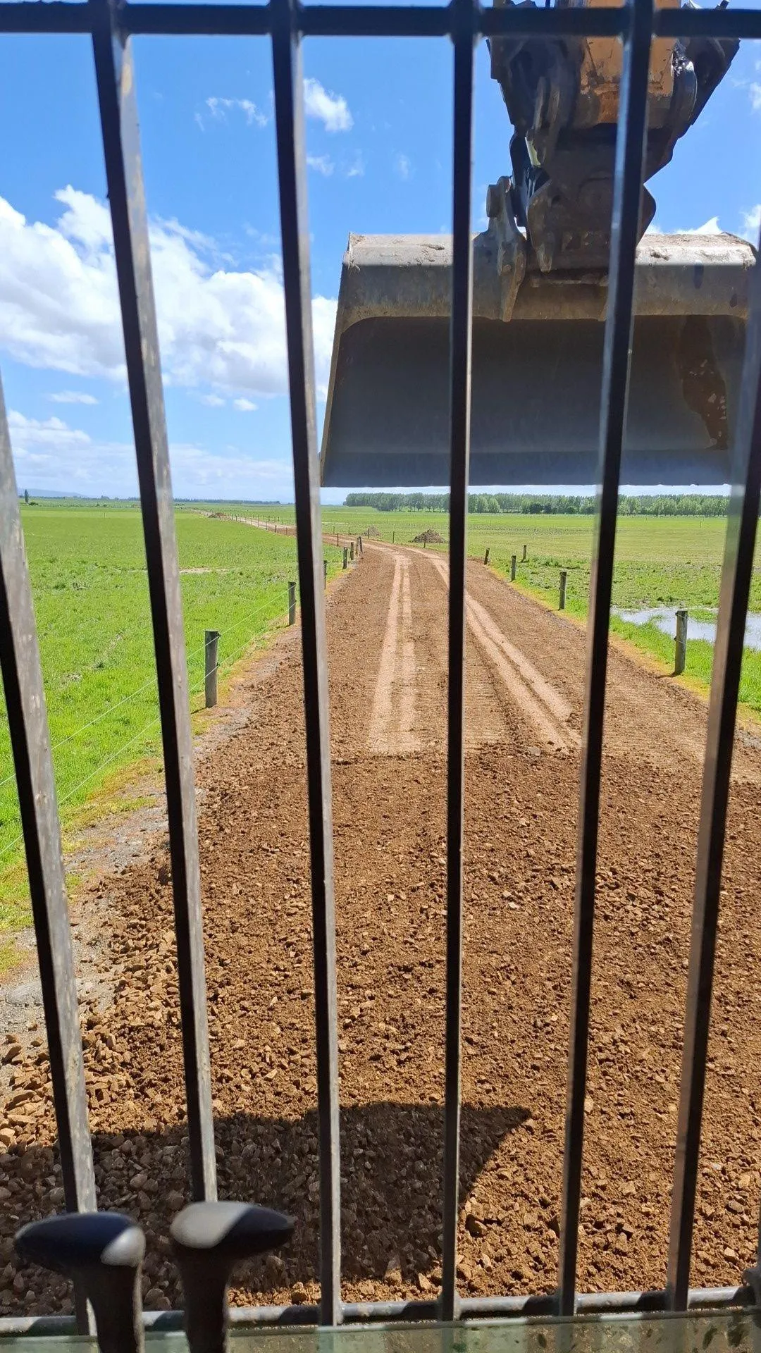 Muck spreading service provided by Dean Moore Excavation, improving farm efficiency in Southland.